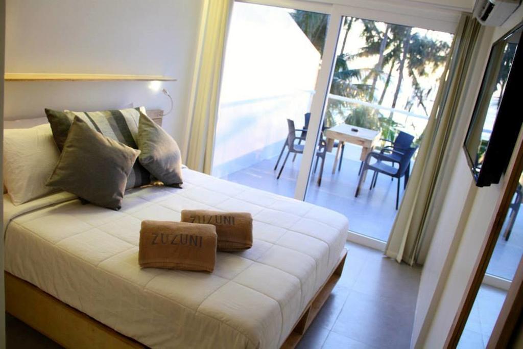 Zuzuni Boutique Hotel Balabag  Habitación foto